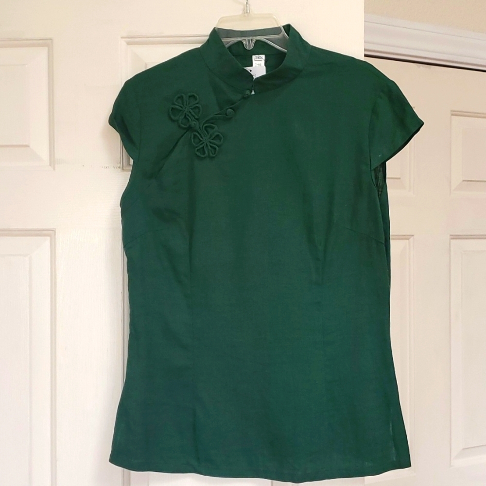 Blouse with knot closures.